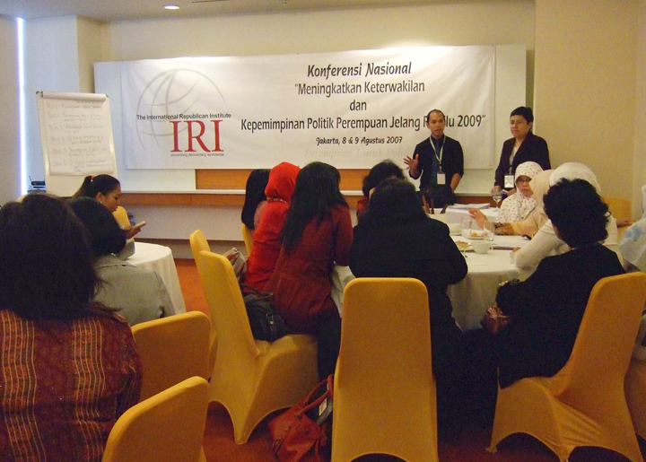 Conference participants attend a workshop on political party reform and candidate selection.