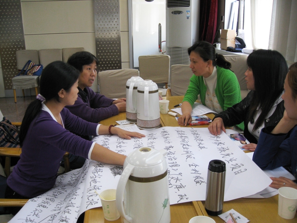 Participants discuss potential projects and their advocacy methods before simulating a meeting with the village committee.