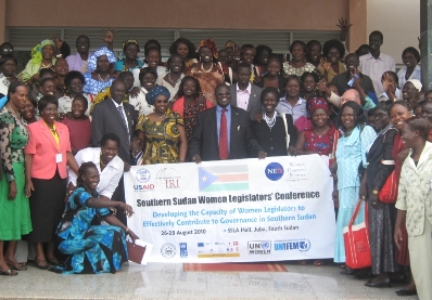 Recently elected members of the SSLA stand alongside the Vice President Machar (center) on the final day of the conference.