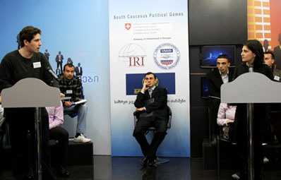 Azerbaijani and Armenian debaters challenge each other's positions.