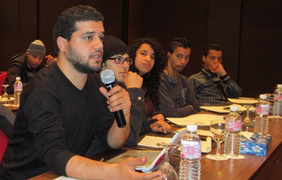 A participant from a Tunisian civil society group asks a question on anti-corruption programs in Georgia.