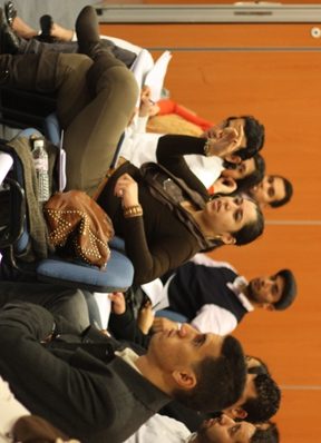 A participant discusses candidate’s techniques during a mock campaign exercise.