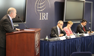 Panelists consider a question posed by Wethington.  Sitting left to right: Muasher, Dunne and Huneifat.