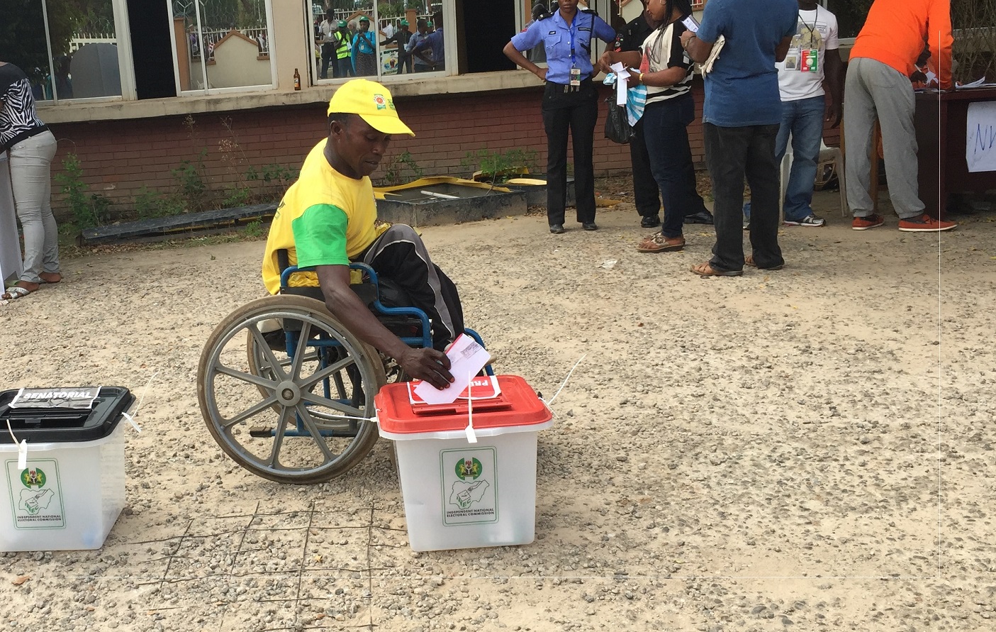A voter casts his ballot.