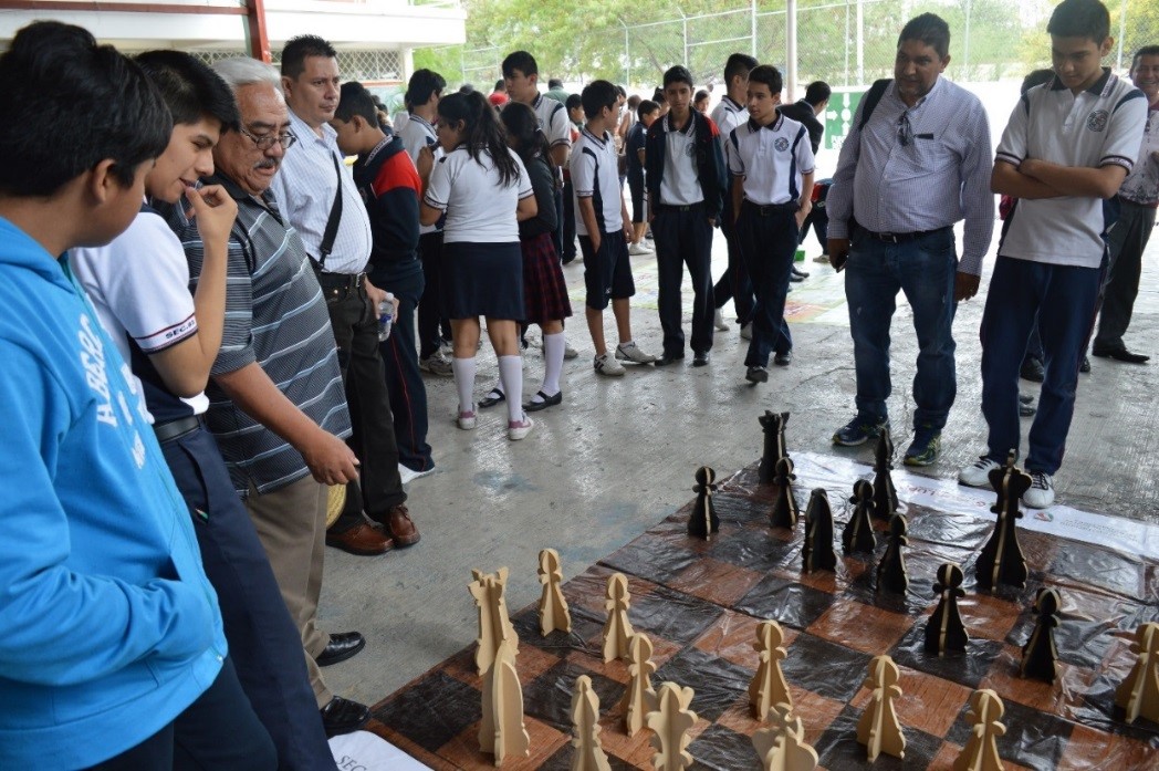 Participants from Guatemala and Honduras visit with students from the Secundaria Tres Caminos in Mexico City. 