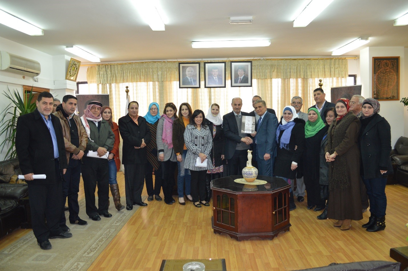 Presenting the mayor of Jordan’s second largest city, Irbid, with the pledge he signed while still a candidate