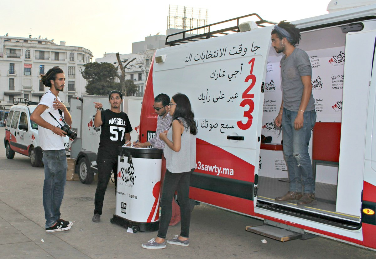 Hit Radio staff strategize how to encourage young Moroccans to participate in the campaign