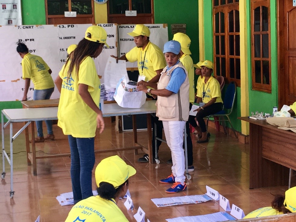 The Polling Center President oversees the vote counting process during the July parliamentary elections in Dili, Timor-Leste.