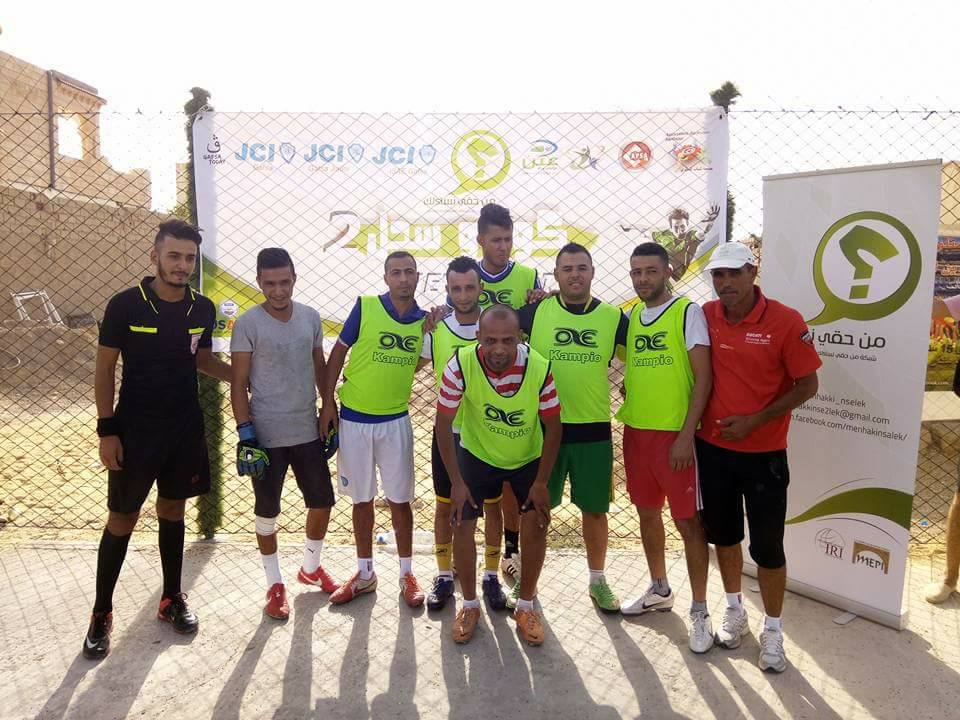 Youth pose for a picture at a soccer tournament and voter registration event in Ksar Mdhilla, Gafsa.