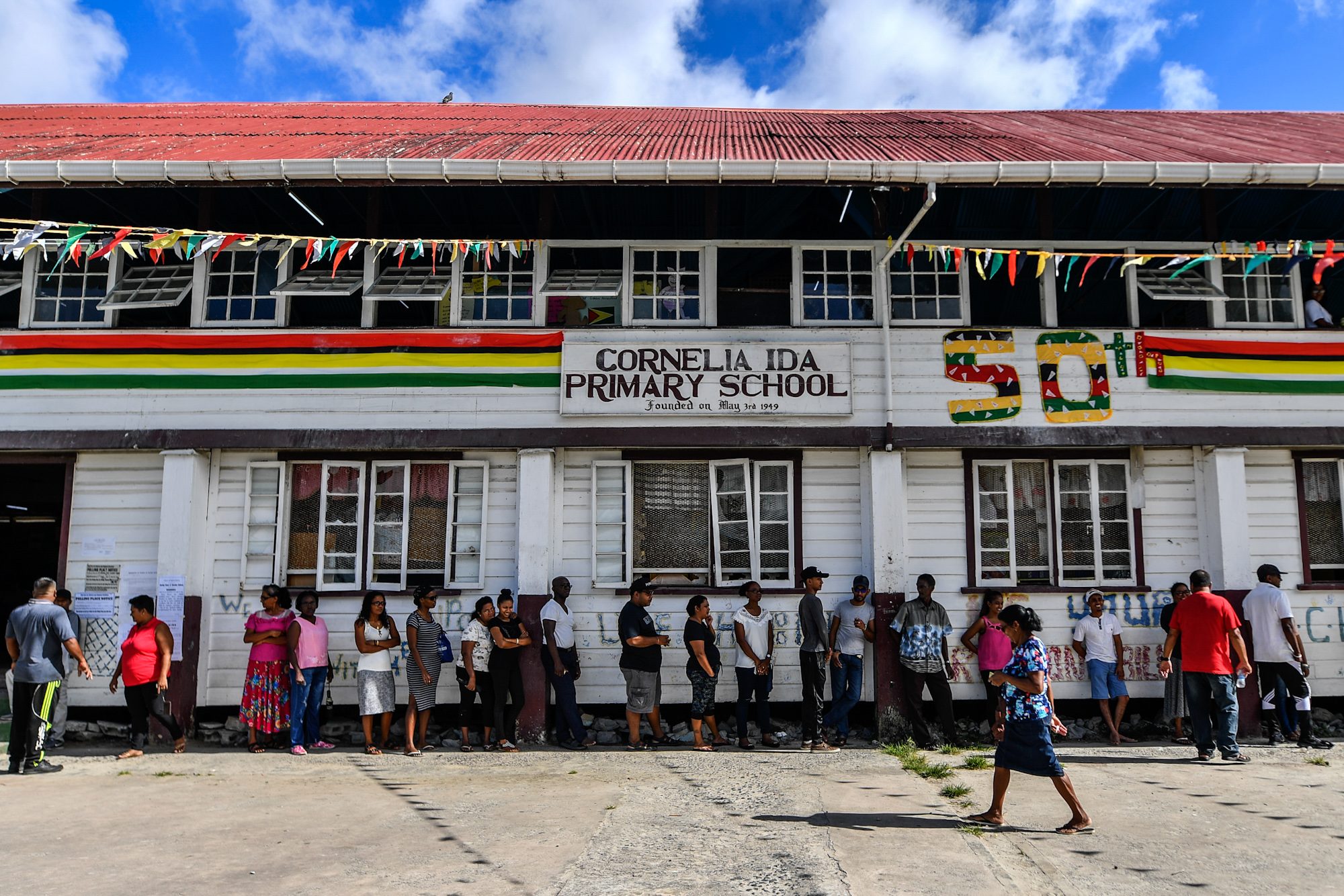 Guyanese citizens line up to vote