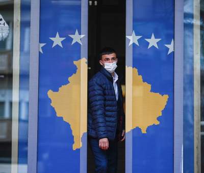 A man exits a government building
