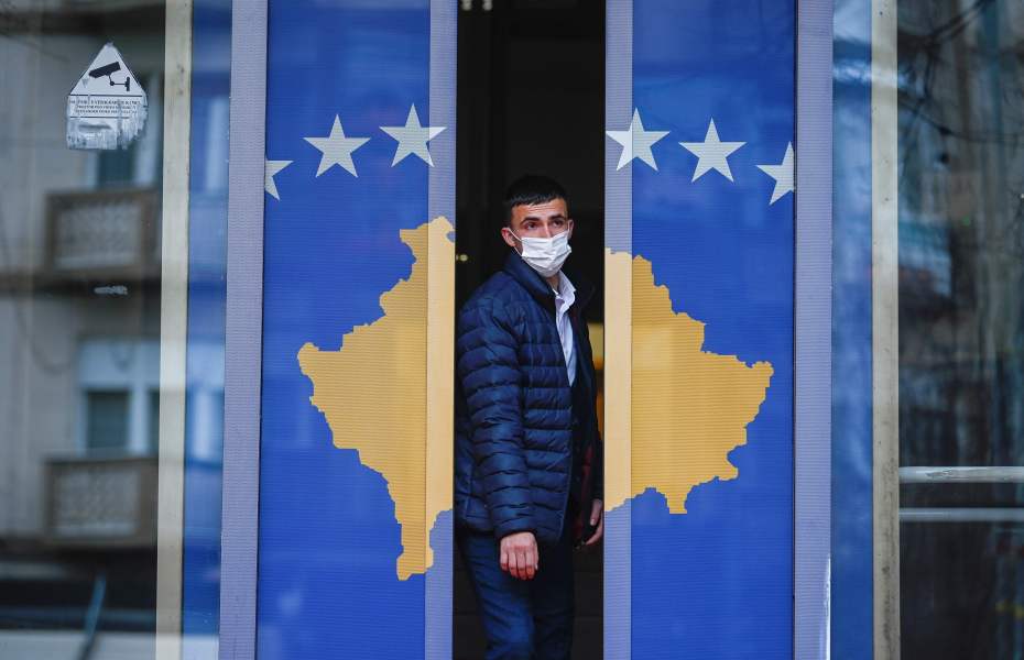 A man exits a government building