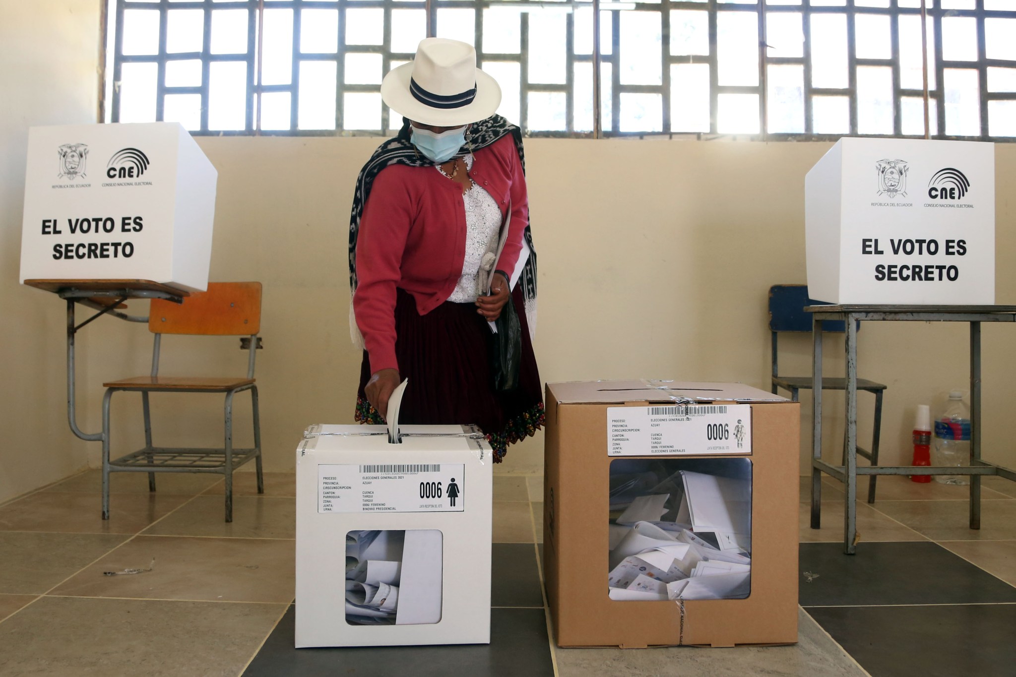 Woman voting in Ecuador