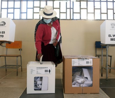 Woman voting in Ecuador