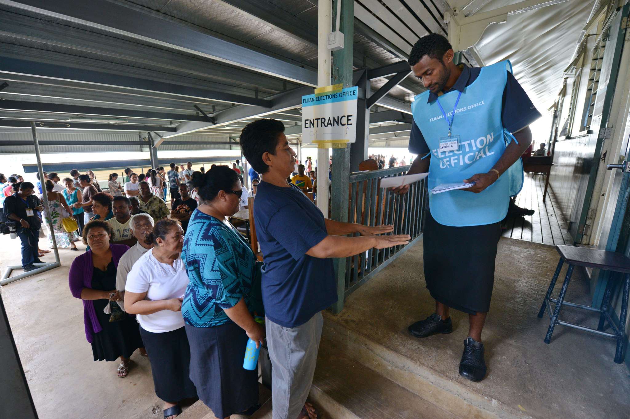 Fiji Voters stand in line