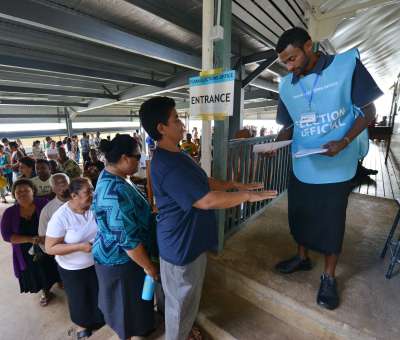 Fiji Voters stand in line