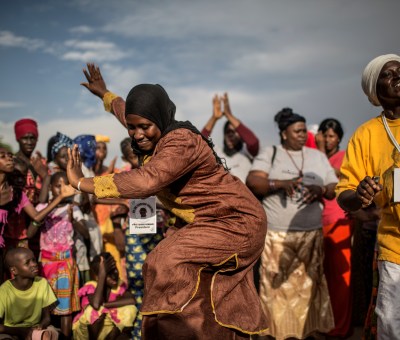 Gambians dancing at political rally