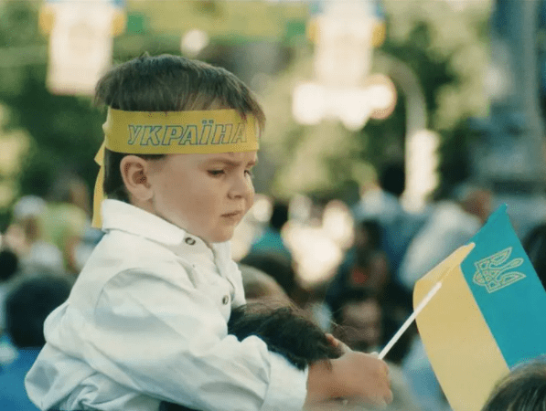 Ukraine boy with flag