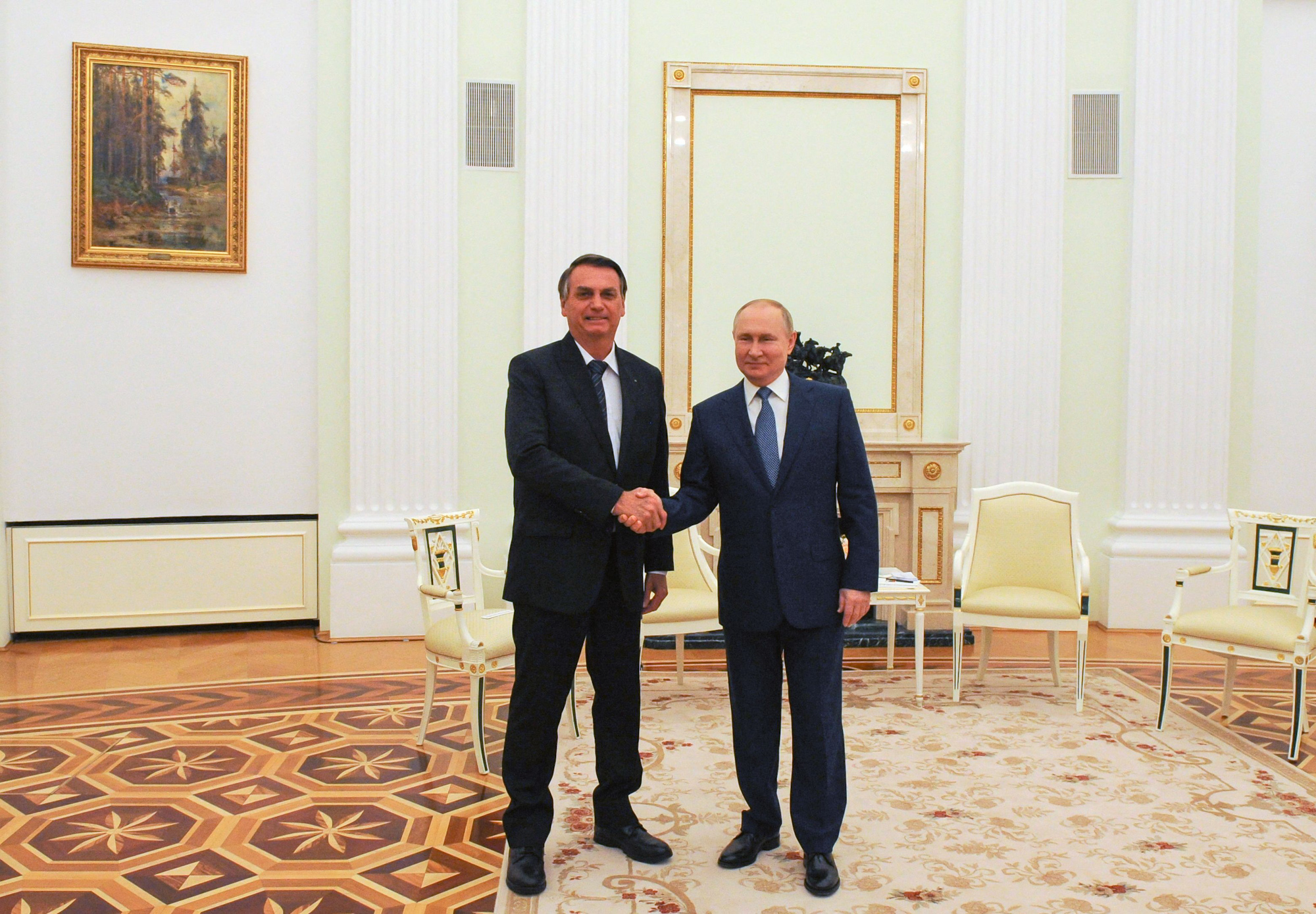 Brazil's President Jair Bolsonaro and President Vladimir Putin Shaking Hands