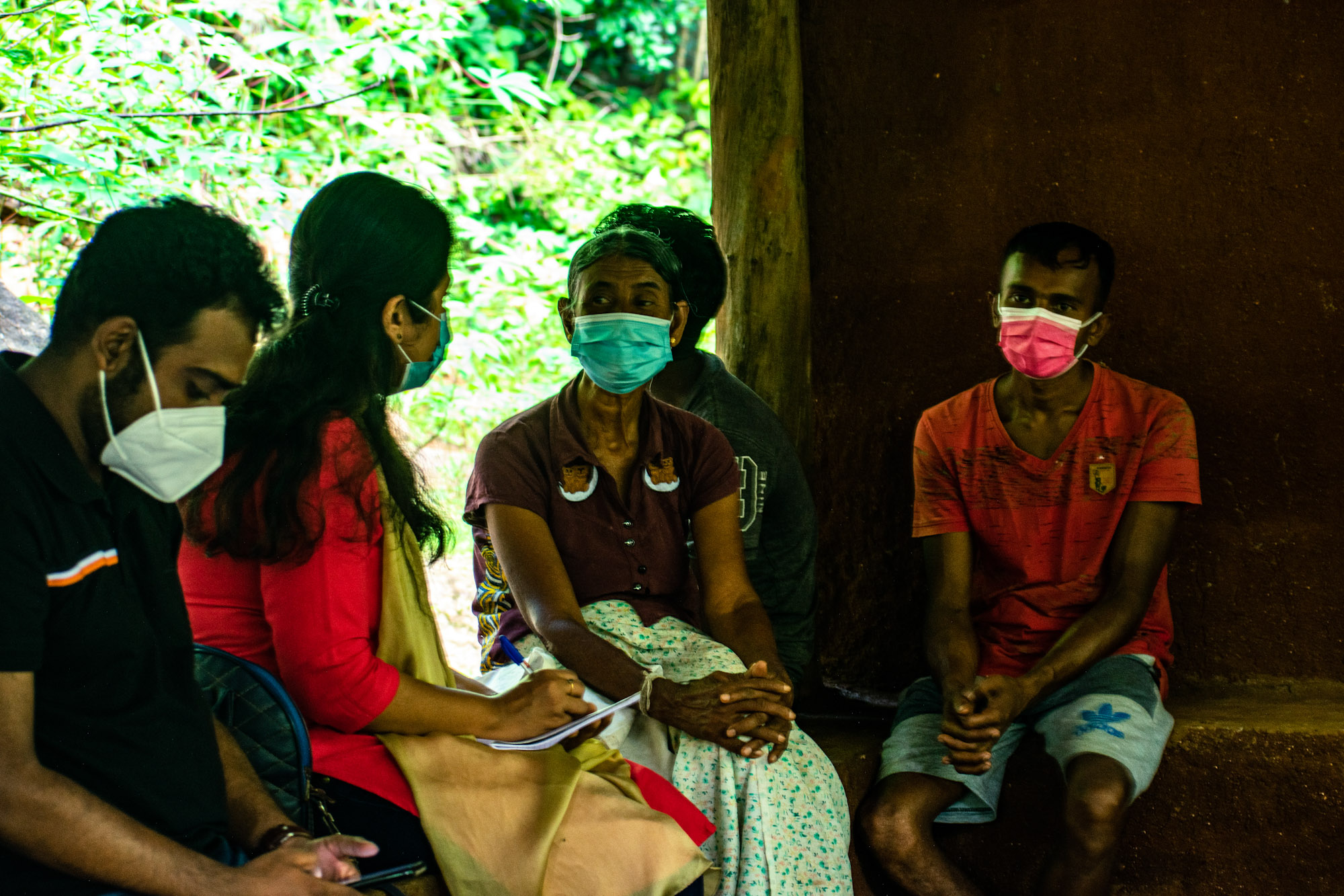 Group of young adults wearing masks